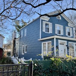 TopLine Home Improvement - insulated blue bayou shake siding.