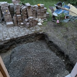 Shazo’s Masonry - The hole they dug and left as a moat outside my front door. House is inaccessible.