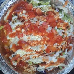 Pupuseria La Migueleña - Super chicken pupusa with mild salsa added
