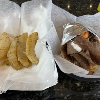GRILLVILLE - Greek potatoes and Gyro Sandwich. - Greek Near Me - Libertyville, Illinois GRILLVILLE - Greek potatoes and Gyro Sandwich. - Greek Near Me - Libertyville, Illinois