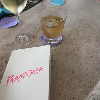 Paradisaea - Champagne at the bar. - New American Near Me - San Diego, California