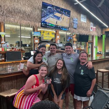 Tiki Hut - a group of people at a tiki hut - Tiki Bars Near Me - La Follette, Tennessee Tiki Hut - a group of people at a tiki hut - Tiki Bars Near Me - La Follette, Tennessee