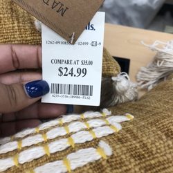 Marshalls - Identical pillows. I was told by manager Sandie " the pricing error is our fault but you still have to pay regular price for one"
