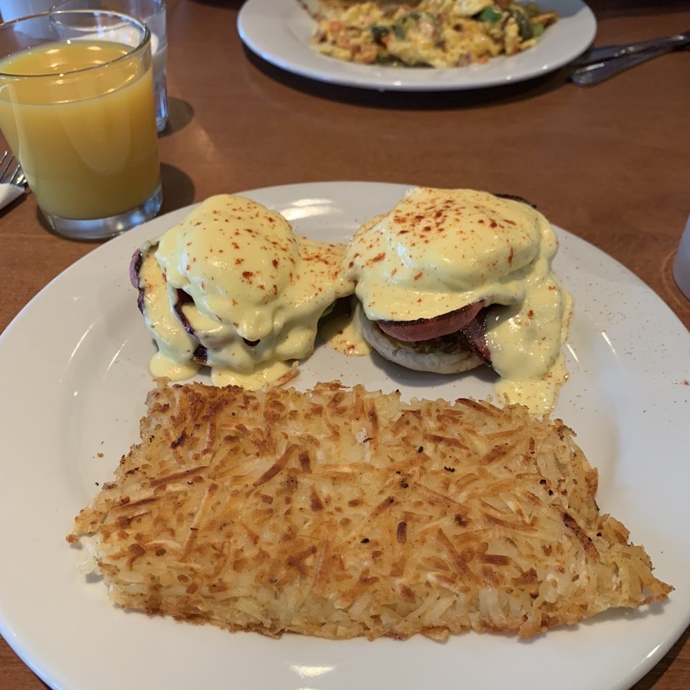 Eggs Benedict foreground, southwest scramble background Eggs Benedict foreground, southwest scramble background