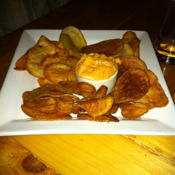 Label - Homemade chips w/ homemade red pepper hummus ($6.50) - New American Near Me - Pittsford, New York Label - Homemade chips w/ homemade red pepper hummus ($6.50) - New American Near Me - Pittsford, New York