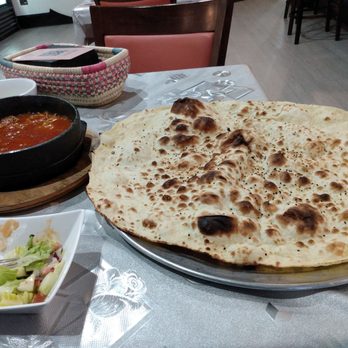One Arabian Night - Marib Restaurant - Lamb fahsa and huge flatbread. - Halal Near Me - Utica, New York One Arabian Night - Marib Restaurant - Lamb fahsa and huge flatbread. - Halal Near Me - Utica, New York
