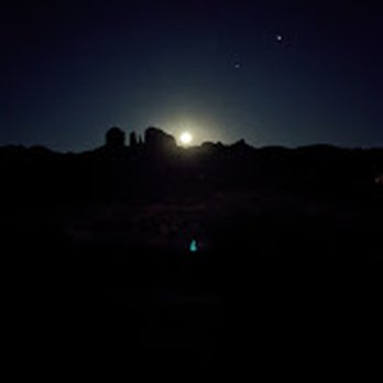 Moondance Sanctuary - Moon rising next to Cathedral Rock.  Yes, that is a green orb in the picture (not a relfection).  We captured lots of them in our photos! - Vacation Rentals Near Me - Sedona, Arizona