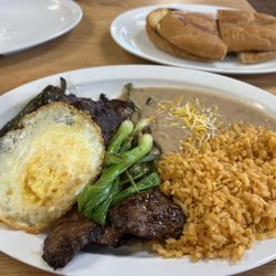 Carne asada with added egg