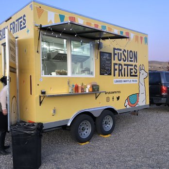 Fusion Frites - a food truck parked in a parking lot - Food Trucks Near Me Fusion Frites - a food truck parked in a parking lot - Food Trucks Near Me
