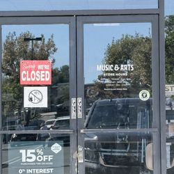 Music & Arts - "Closed" sign next to the hours indicating they are open