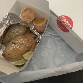 Peruvian Brothers - Spinach and cheese empanadas. Limes, and 2 different sauces - Peruvian Near Me - Washington, DC, District of Columbia Peruvian Brothers - Spinach and cheese empanadas. Limes, and 2 different sauces - Peruvian Near Me - Washington, DC, District of Columbia