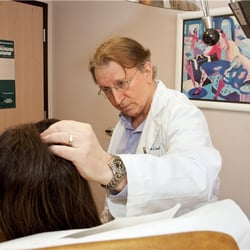 Blair S Kranson, MD - Dr. Kranson examines a patient.