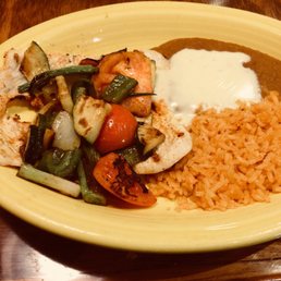 That "tortilla" is actually the grilled chicken beneath the veggies. That "tortilla" is actually the grilled chicken beneath the veggies.