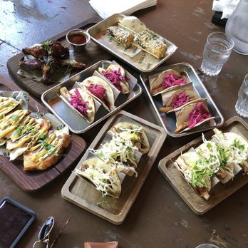 Ball & Chain - Jerk Roasted chicken wings on the top left, corn on the right, the mahi tacos in the middle, and lechon ones on the bottom, quesadilla left - Music Venues Near Me - Miami, Florida