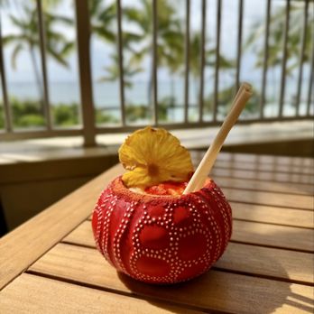 Tikis Grill & Bar - Li Hing Mui Pineapple Colada with a lovely beach view. - Seafood Near Me - Honolulu, Hawaii Tikis Grill & Bar - Li Hing Mui Pineapple Colada with a lovely beach view. - Seafood Near Me - Honolulu, Hawaii
