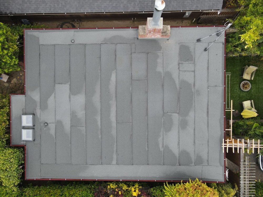 Slide of Real Roofing