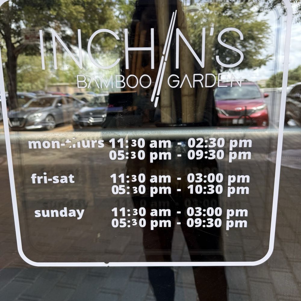 Restaurant hours are displayed on the door!