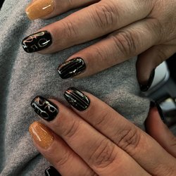 Natural Nails and Spa - Amazing work like always , my New Years nails how fantastic