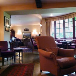 The Pheasant Inn - The larger of the two residents' lounges. It has an enormous wood-burning stove and plenty of comfortable seats.