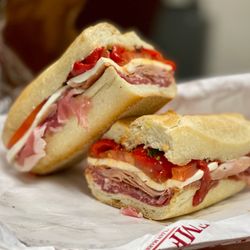 EMF Gourmet Italian Market - imported prosciutto, hot capicola, sweet sopressata, mortadella, fresh mozzarella, tomato, roasted red peppers, balsamic vinegar & oil