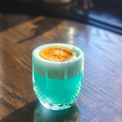 Crave Kitchen & Wine Bar - Teauila Curacdo Sour