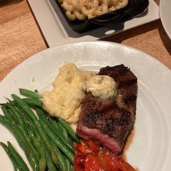 Seasons 52 - Wood-Grilled Kona-Crusted Lamb Loin, green beans, yukon mash, Roasted Tomato, Mac 'N' Cheese - Seafood Near Me - Birmingham, Alabama Seasons 52 - Wood-Grilled Kona-Crusted Lamb Loin, green beans, yukon mash, Roasted Tomato, Mac 'N' Cheese - Seafood Near Me - Birmingham, Alabama