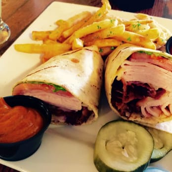 Kooper's Tavern - Smoked Turkey Club (made as a wrap) - Bars Near Me - Baltimore, Maryland Kooper's Tavern - Smoked Turkey Club (made as a wrap) - Bars Near Me - Baltimore, Maryland