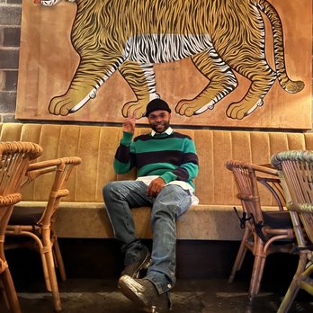 The Tyger - The happy patron - Cocktail Bars Near Me - New York, New York