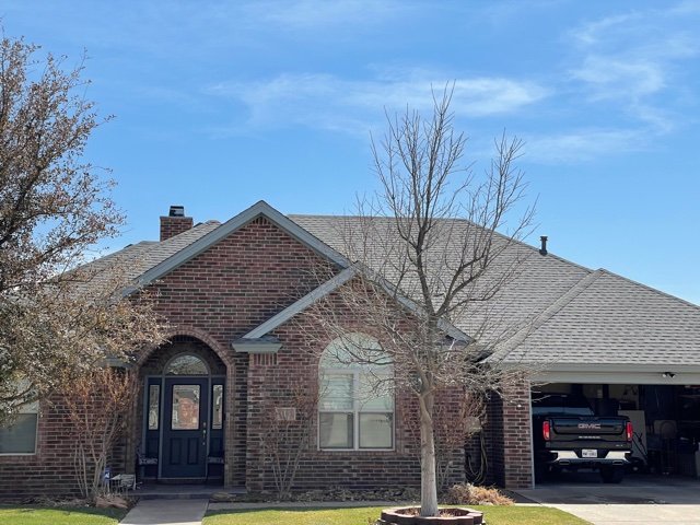 Slide of Roof Master & Construction