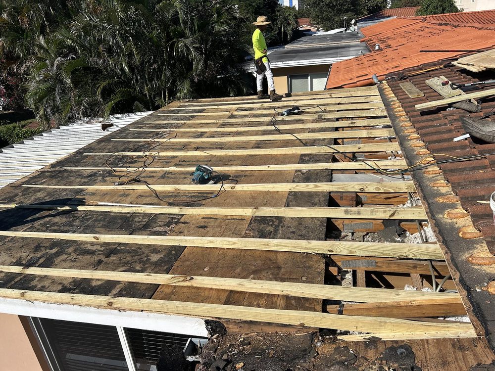 Slide of Fred Roofing Service