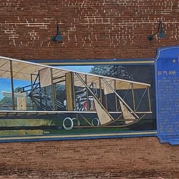 Market On The Hill - The Wright Brothers mural on the side of the building. A fascinating bit of Mt. Pulaski history. - Grocery Near Me - Mount Pulaski, Illinois Market On The Hill - The Wright Brothers mural on the side of the building. A fascinating bit of Mt. Pulaski history. - Grocery Near Me - Mount Pulaski, Illinois