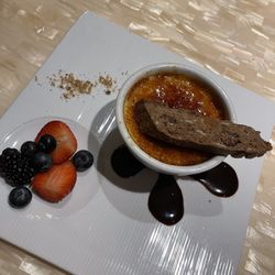 Jimmy's Seafood & Steak - Creme brûlée and biscotti with a side of fruit and chocolate