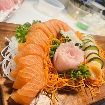 Sushi Yuu - a variety of sushi on a cutting board - Sushi Bars Near Me - Beaconsfield, Quebec Sushi Yuu - a variety of sushi on a cutting board - Sushi Bars Near Me - Beaconsfield, Quebec