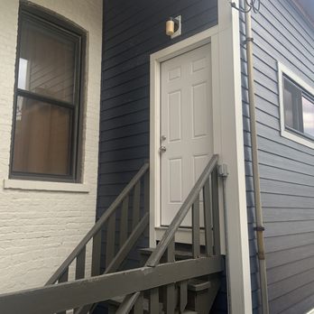 Jacobs 1 Construction - New Door, cut into framing and sized to be bigger than old door - Siding Near Me