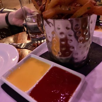 Union 50 - Duck fat + rosemary fries with beer cheese and house ketchup - Gastropubs Near Me - Indianapolis, Indiana Union 50 - Duck fat + rosemary fries with beer cheese and house ketchup - Gastropubs Near Me - Indianapolis, Indiana