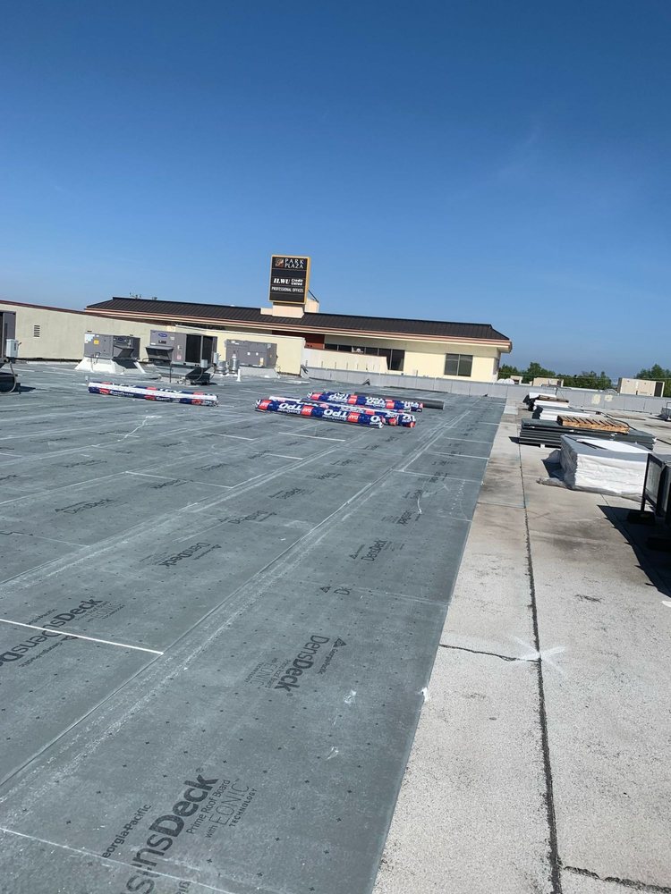 Slide of Tecun’s Roofing
