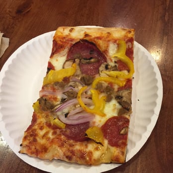 Mustafio's Pizza - Combo Slice with generous toppings and crispy crust. - Pizza Near Me - San Francisco, California Mustafio's Pizza - Combo Slice with generous toppings and crispy crust. - Pizza Near Me - San Francisco, California