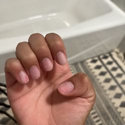 City Nails & Spa - On pinky you can notice it more where he drilled so far it burned. This is after I fix them up at home