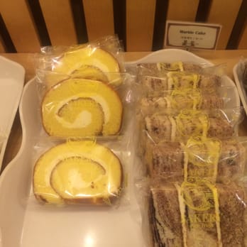 Kim's Bakery - My favorite. I don't know the actual name but I call it "sponge swirl cake" - Bakeries Near Me - Chesterfield, Missouri