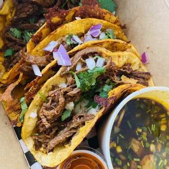 Kyu Grill - Birria tacos with small side consommé. $14.29 plus taxes + tip (not included) - Food Trucks Near Me