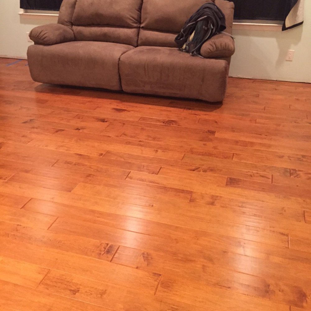 Finished living room.  Done in Heirloom Maple Syrup, hand scraped.  Just beautiful.
