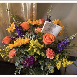 Mid-priced floral arrangement from Above the Stem that looks very much like the photo on the website. Wow. Mid-priced floral arrangement from Above the Stem that looks very much like the photo on the website. Wow.