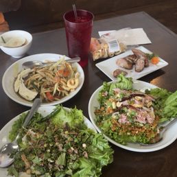 Papaya salad,labb beef, and Nam khao. Papaya salad,labb beef, and Nam khao.