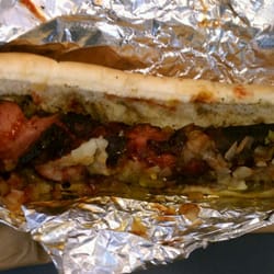 Carlos' Hot Dogs - The Polish w/ onions, relish and bbq sauce!  Yum!