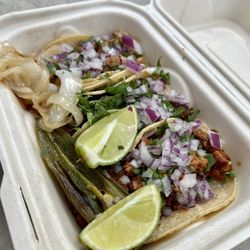 Pollo asada, carne asada, and Al pastor tacos (top to bottom)