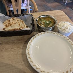 Baingan saraf main dish with rice and paratha Baingan saraf main dish with rice and paratha