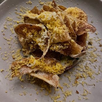 Sepia - Beef tartare with crispy caramelized onion and shaved egg yolk - New American Near Me - Chicago, Illinois