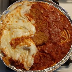 Frank's Pizzeria - Chicken Parm. Once you stir it a little you realize it's NOT over-sauced,