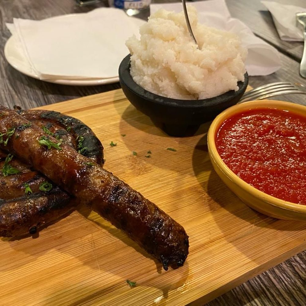 boerower (sausage looking) with tap (the white thing look like mashed potato....but tap is is corn-based) and tomato chutney boerower (sausage looking) with tap (the white thing look like mashed potato....but tap is is corn-based) and tomato chutney