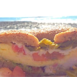 Kb's Bagel - Get the chi-chi made vegetarian! Avocado instead of meat...on a multigrain bagel...yum. And take to the beach!
